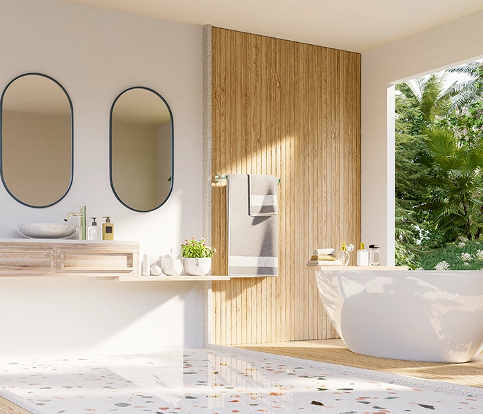 Baño reformado con bañera exenta.